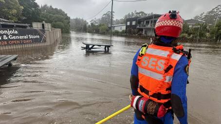 A SES volunteer during a flood rescue at Lake Conjola at 8.30am on Wednesday, November 29. Picture by SES