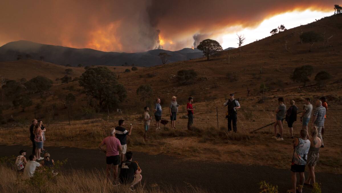 Climate change is helping to increase the frequency and severity of bushfires. Picture: Sitthixay Ditthavong