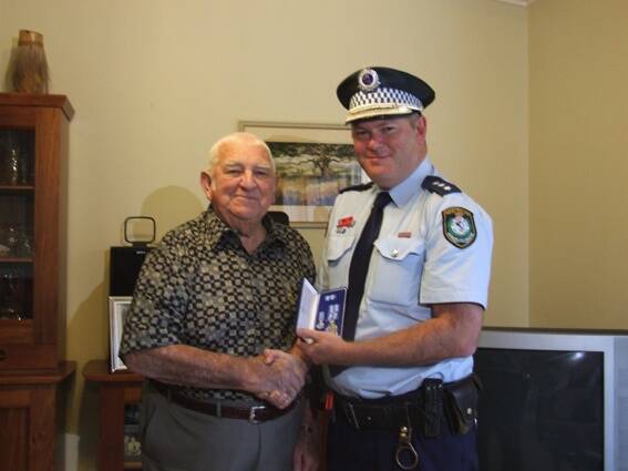 • Former local police officer Fred Pitchford was presented with his 20-year Police Medal by Inspector Jason Edmunds last week.
