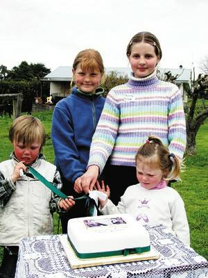 The youngest members of the Alcock family currently living at Crystal Brook - Callum (4), Natasha (8), Jacinta (10) and Halle (3) - had the honour of cutting the centenary cake on Saturday.