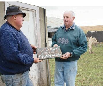 • The cows are still grazing while Peter (left) and Ray Ubrihien reflect on the end of over 100 years of Ubrihien dairy farming.