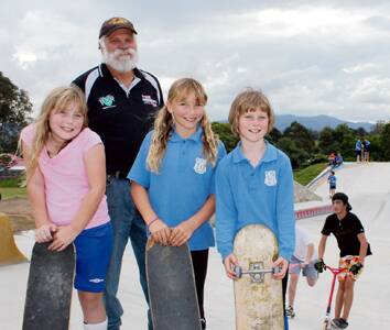 • Cobargo skate park project manager Dave Rugendyke surveys the new facility with (from left) Paige Van Dam, Jacinta Carr and Ashley Gosch ahead of tomorrow’s official opening. 