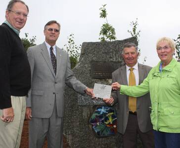 • President of the Bega-Little Citizens Exchange Tony McDermott (left), Consul General of United States of America Niels Marquardt, Bega Valley Shire mayor Tony Allen and Littleton delegates’ leader Jan Brosseau with the new plaque at Columbine Park, Bega on Saturday morning.