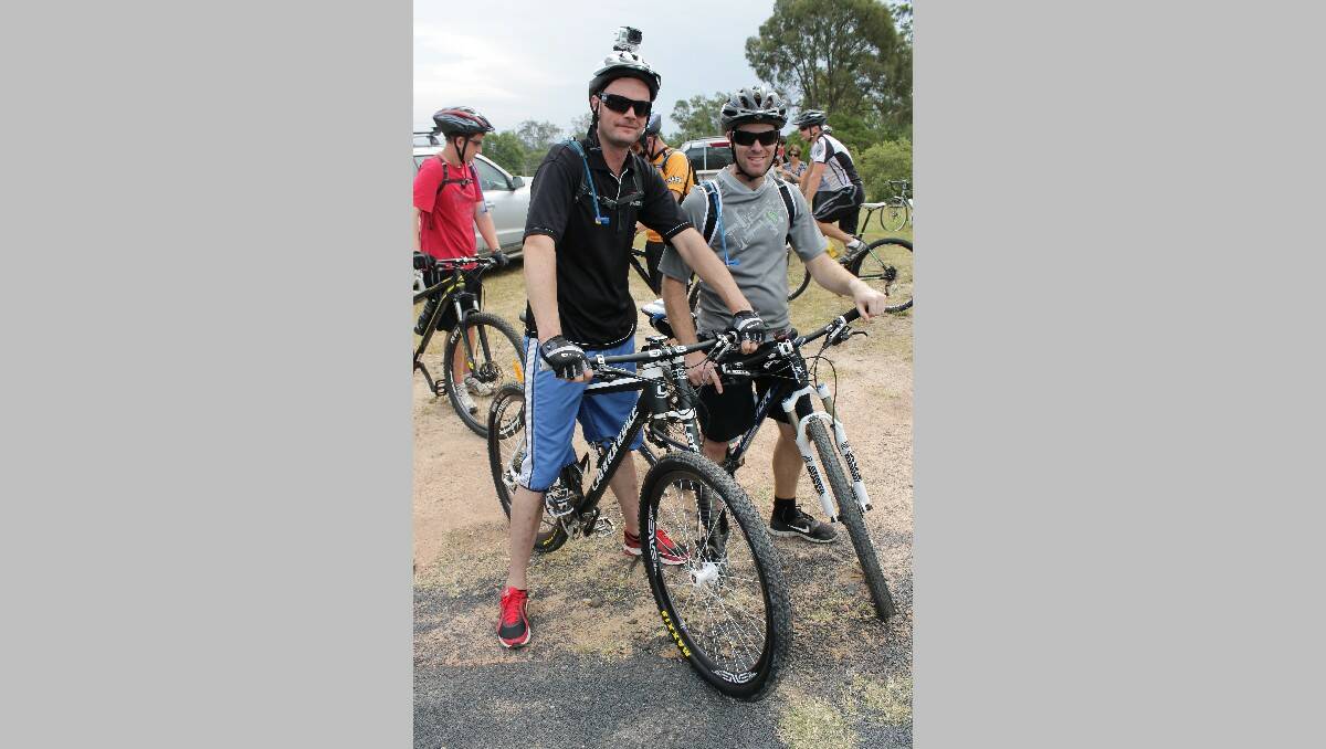 Bega’s Beau Griggs (left), who has a camera strapped to his head to film the ride, catches up with Dean Whyman.
