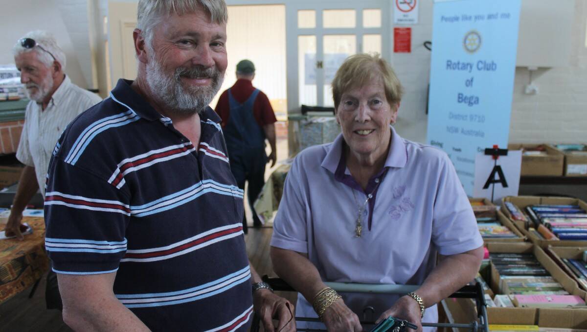 Phil and Jane Donoghue of Tura make their final selections during the weekend’s Rotary Book Fair.