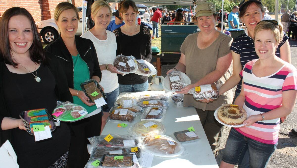 Looking after the cake stall on Saturday are Bega Pre-School fundraising committee members (from left) Gemma Russell, Kristie Smith, Kirsty Umbers, Tracy Byrnes, Nicky Bateman, Tanya Tomlinson and Cath James.