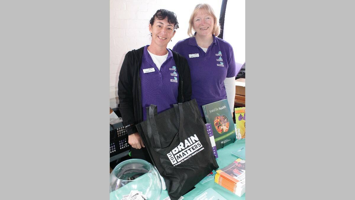  Alzheimer's Australia representatives Samantha Joyce and Barbra Williams promote the "Your Brain Matters" program at Bega's NAIDOC Week celebrations.