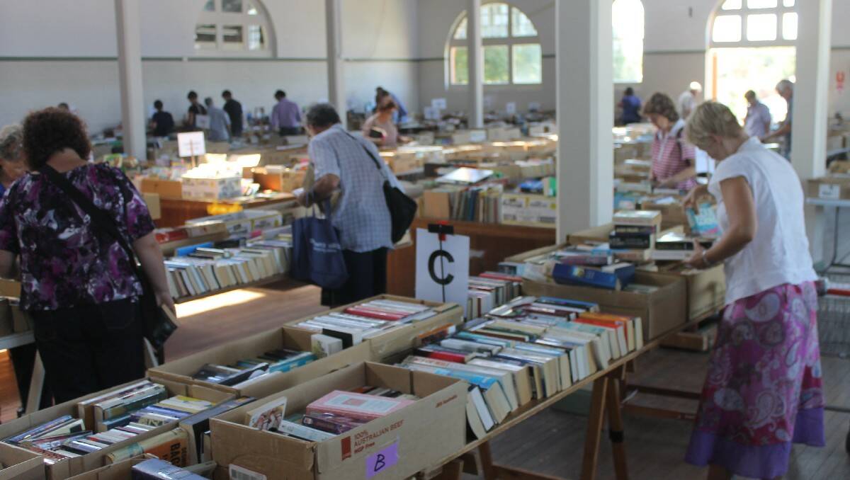 Book-lovers and bargain hunters browse the wares during the Rotary Book Fair.