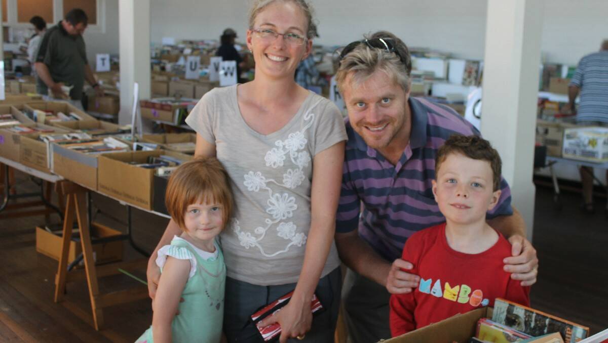 Enjoying the huge variety of second-hand books at the Rotary event are Sydneysiders Fiona and Matt McClelland with their children Laura and Eric, during a visit to Fiona’s grandmother Islet Pauline.