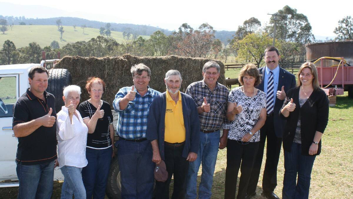Celebrating Labor’s commitment to the Bega Valley Fireweed Association are (from left) Darrell Moxey, Judy Adams, Marie Watson, Martin Simms, Noel Watson, Steve Guthery, Tanya Rutter, Member for Eden-Monaro Mike Kelly and Anne-Marie Moxey. 