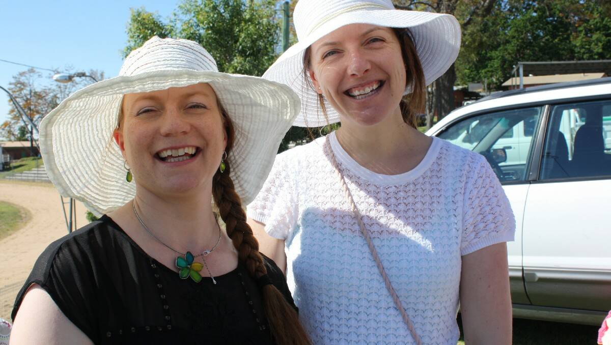 Stallholders Mari Smyth and Kirsty Avery share a friendly chat on a sunny Saturday morning.
