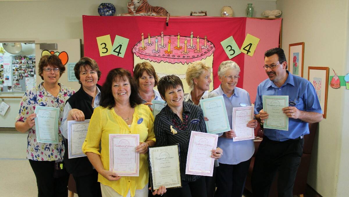 Receiving their long service awards during Hillgrove House’s 34th birthday celebrations last week are (from left) Vicki Sant, Karen Tett, Joy Smiles, Shiralee Wall, Kerry McKenzie,  Debbie Tacilauskas, Janice O’Halloran and Gilbert Mitchell.