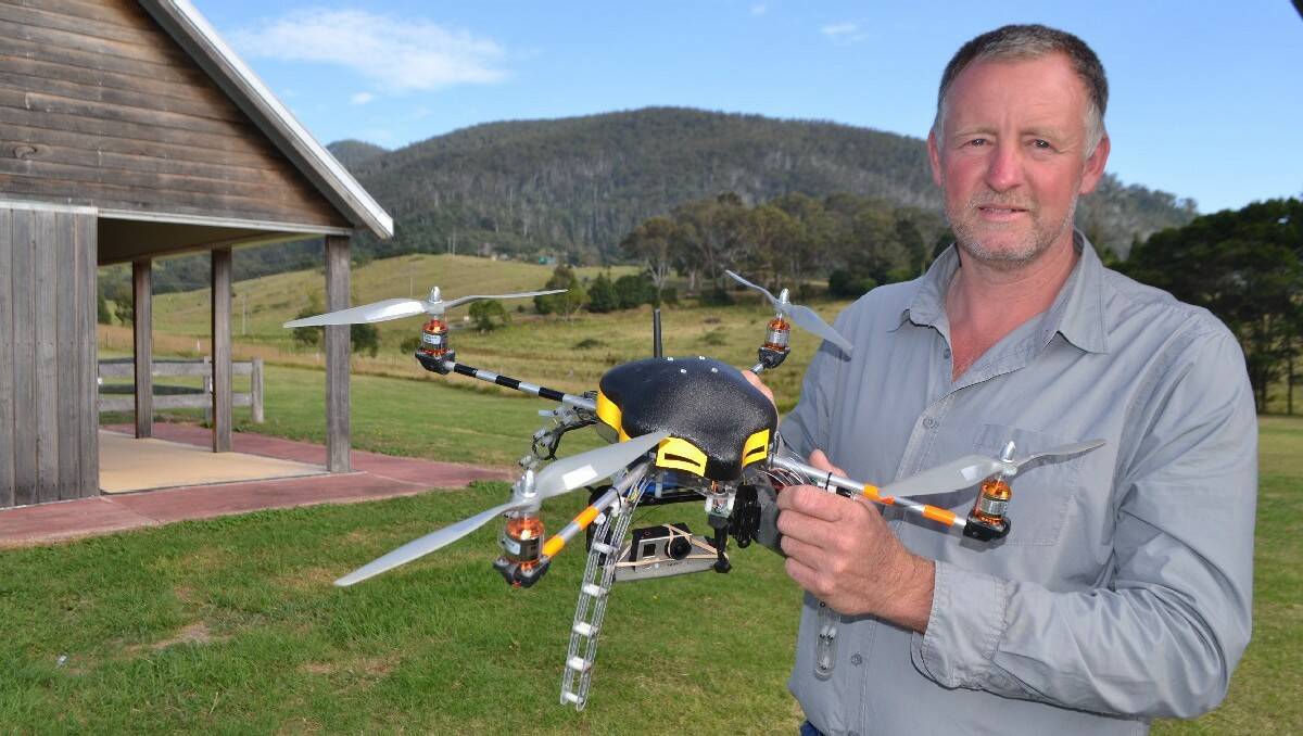 Warren Purnell from Project Vulcan Unmanned Aerial Systems and his custom built UAV or unmanned aerial vehicle, the perfect platform he says for assisting firefighters in their bushfire duties.