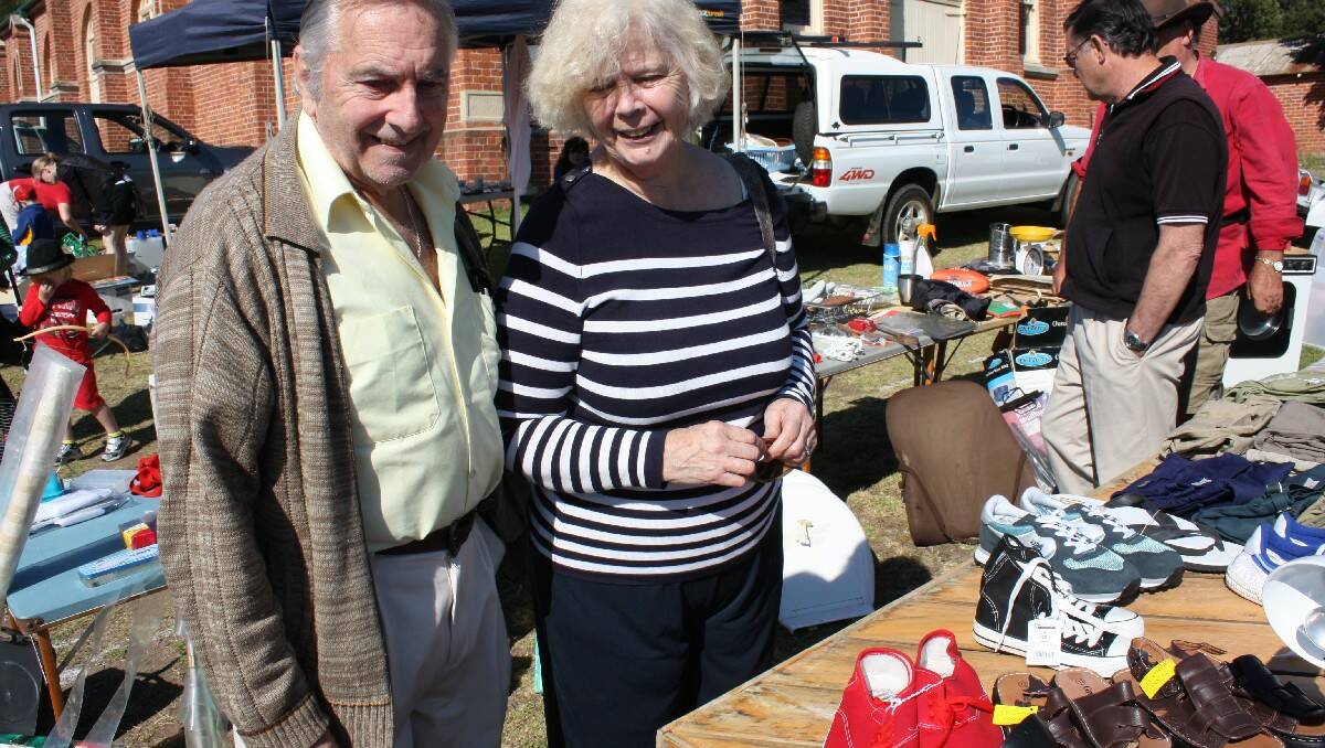 Queensland visitors Colin and Linda Anetts peruse the bargains on offer at the Bega Showground.