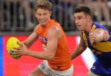 GWS star Lachie Whitfield (left) is confident he can cope with being tagged. (Richard Wainwright/AAP PHOTOS)