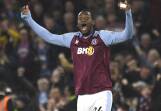 Striker Jhon Duran rouses up the Villa crowd after one of his goals in the draw with Liverpool. (AP PHOTO)