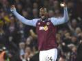 Striker Jhon Duran rouses up the Villa crowd after one of his goals in the draw with Liverpool. (AP PHOTO)