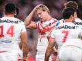 Hoping to finish his NRL career a one-club player, Jack de Belin's (centre) future remains clouded. (Dan Himbrechts/AAP PHOTOS)