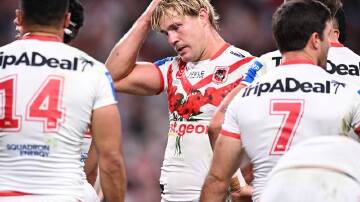 Hoping to finish his NRL career a one-club player, Jack de Belin's (centre) future remains clouded. (Dan Himbrechts/AAP PHOTOS)