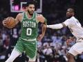 Boston Celtics forward Jayson Tatum (0) had 33 points and 11 rebounds against Cleveland. (AP PHOTO)